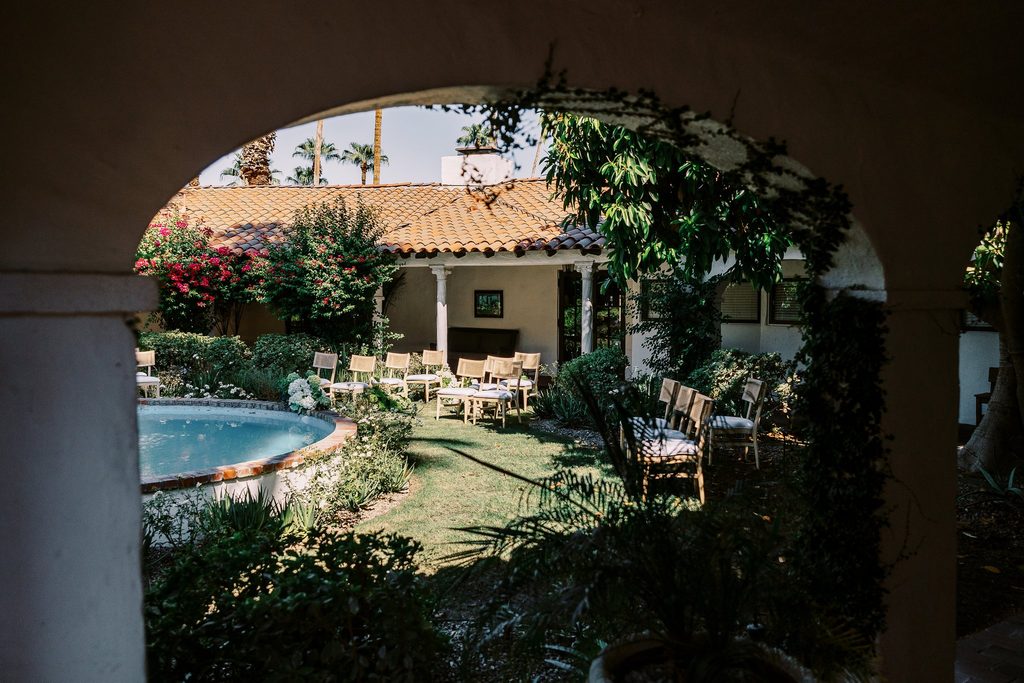 Fountain courtyard ceremony space at Ingleside Estate, styled with chairs for a wedding welcome brunch